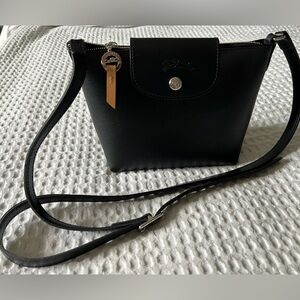 LONGCHAMP
Le Pliage City Crossbody bag